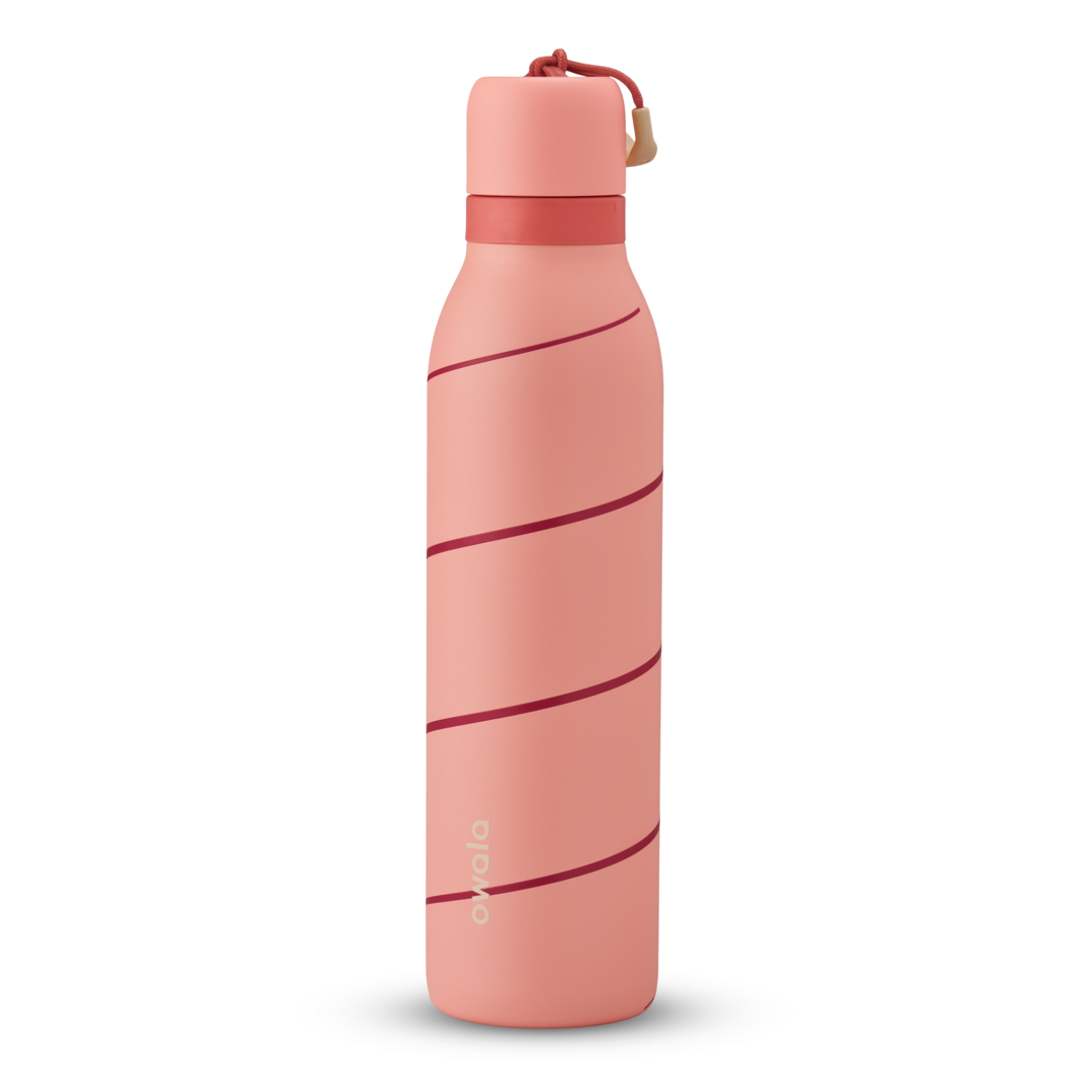 FreeSip Twist 24oz, coral pink body with orange-red lid and purple band; slim insulated bottle