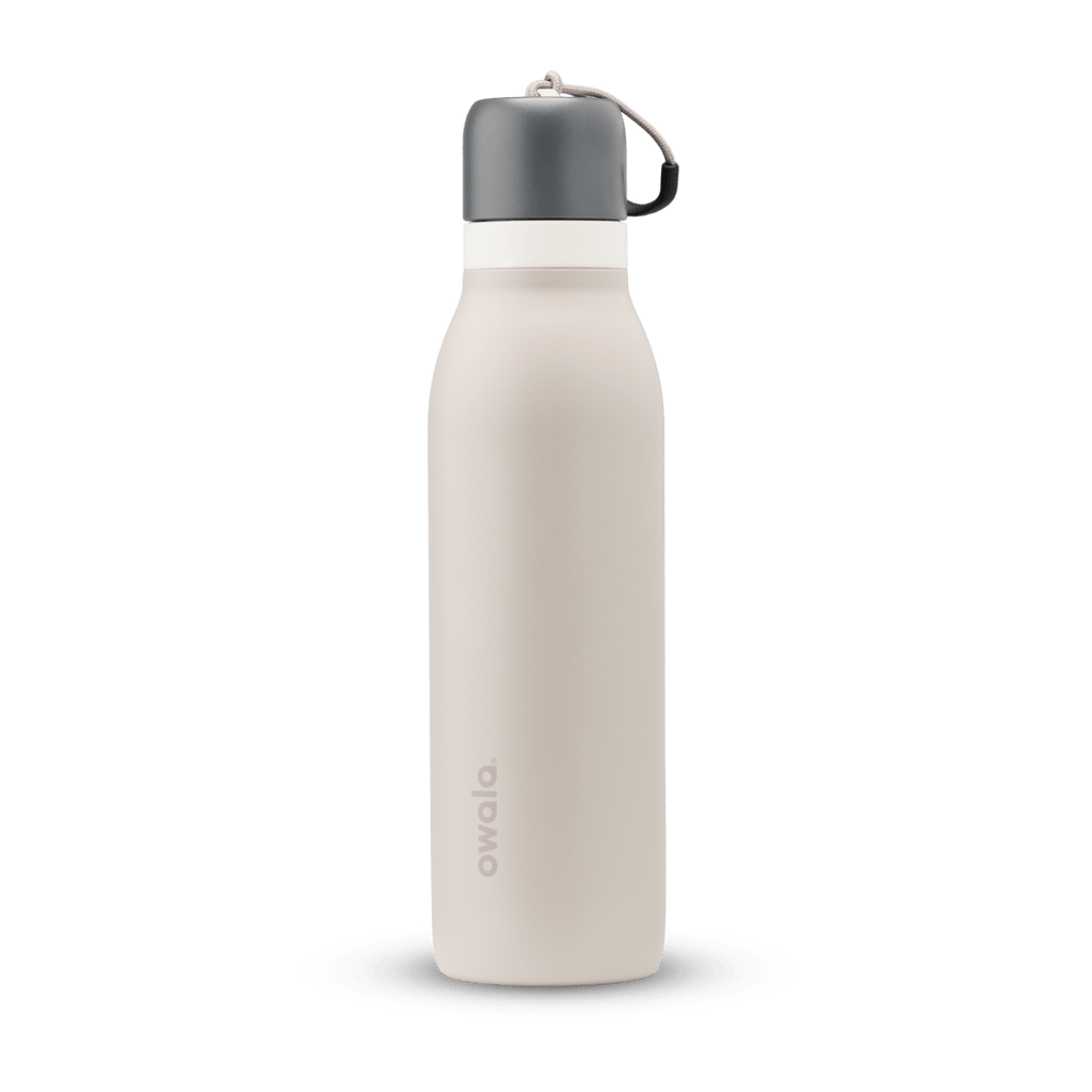 FreeSip Twist 24oz, coral pink body with orange-red lid and purple band; slim insulated bottle