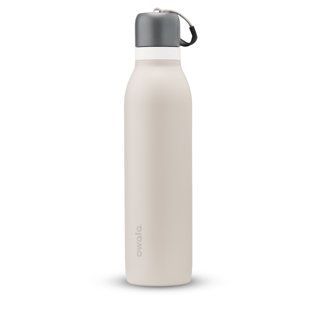 FreeSip Twist 24oz, coral pink body with orange-red lid and purple band; slim insulated bottle